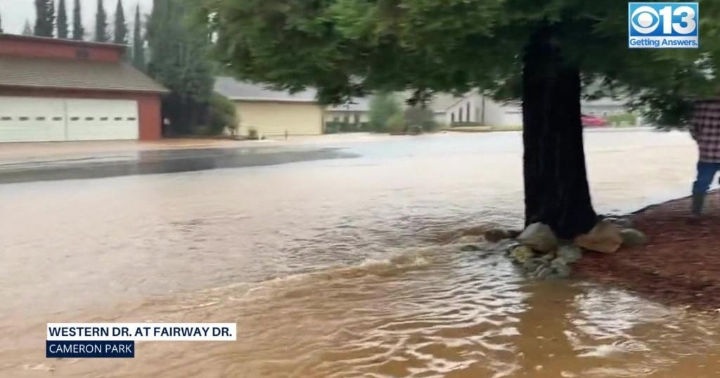 Raw: Water flowing down streets in Cameron Park