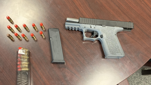 Black and white close-up of silver handcuffs 