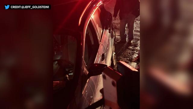 Minor damage to the side of a vehicle that had been clipped by a Metro-North train. 