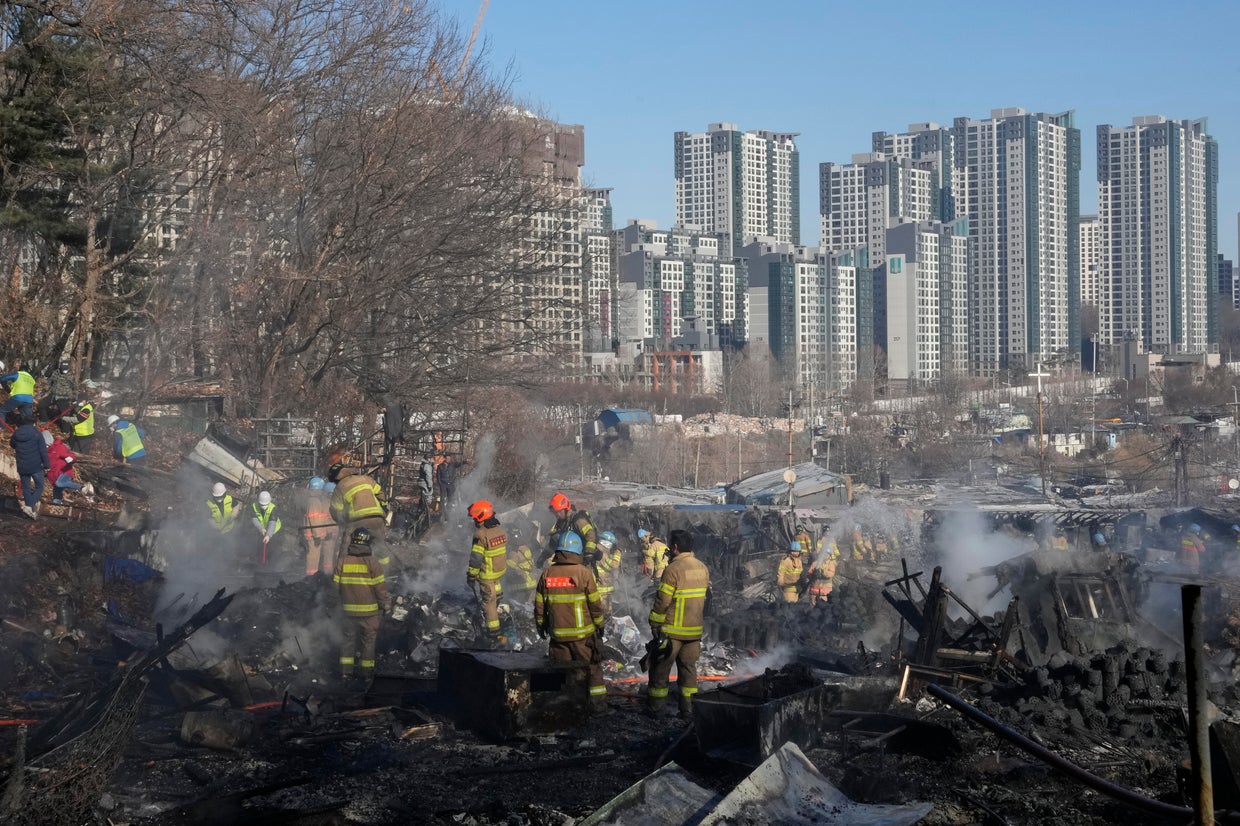 Fire tears through illegal home encampment on edge of South Korea's