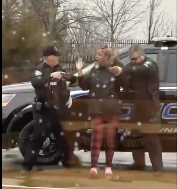 A screenshot from video showing Butler Township officers Sgt.  Tim Zellers, left, and Todd Stanley, right, restrain and arrest Laticka Hancock outside a McDonald's restaurant in Butler Township, Ohio, Monday, Jan. 16, 2023. 
