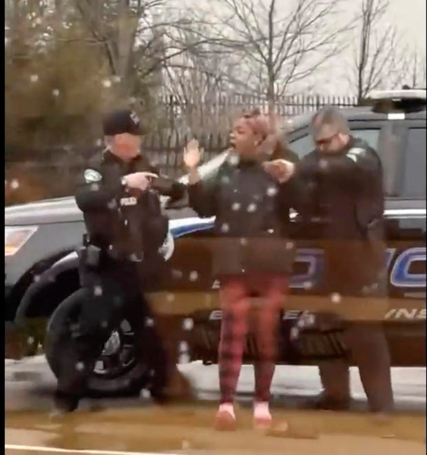 A screengrab from video showing Butler Township officers Sgt. Tim Zellers, left, and Todd Stanley, right, restrain and arrest Laticka Hancock outside a McDonald's restaurant in Butler Township, Ohio, on Monday, Jan. 16, 2023. 