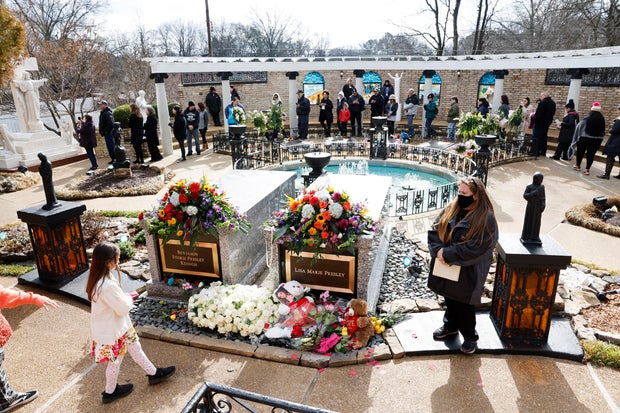 Fans sojourn  the sedate  of Lisa Marie Presley astatine  Graceland during her memorial connected  Jan. 22, 2023, successful  Memphis, Tennessee. 