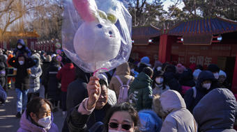 China's COVID surge casts a shadow over the Lunar New Year travel rush 