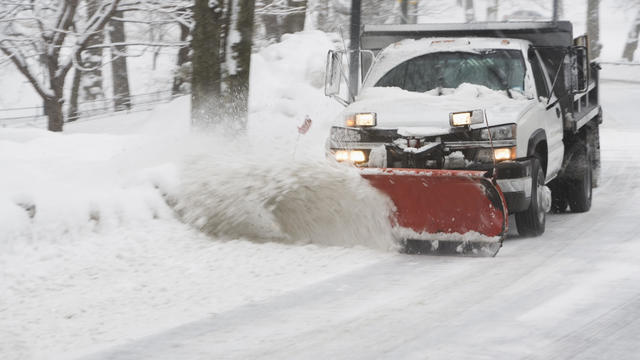 USA, New York City, snowplowing truck 