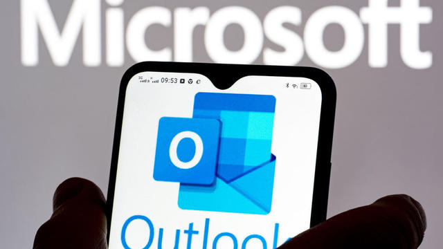 In this photo illustration a Microsoft Outlook logo seen 