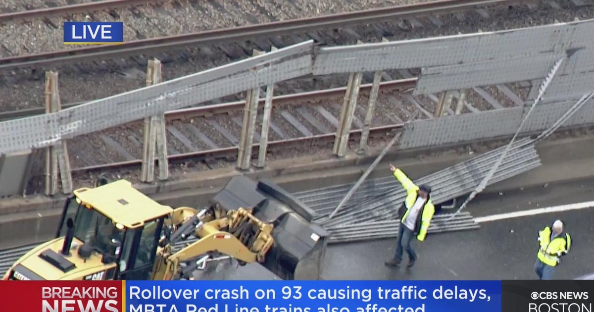 Rollover crash on I-93 damages fence, shuts down part of Red Line - CBS