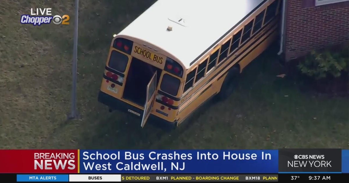 School bus crashes into home in West Caldwell, N.J. - CBS New York