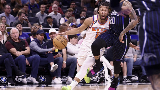 Jalen Brunson #11 of the New York Knicks dribbles the ball as Markelle Fultz #20 of the Orlando Magic defends during the first quarter at Amway Center on February 07, 2023 in Orlando, Florida. 