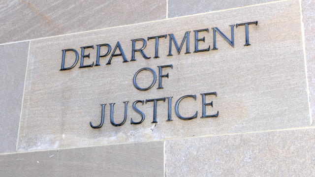 Department of Justice sign, Washington DC, USA 