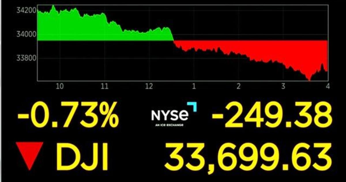 Stocks down as more companies announce layoffs CBS News