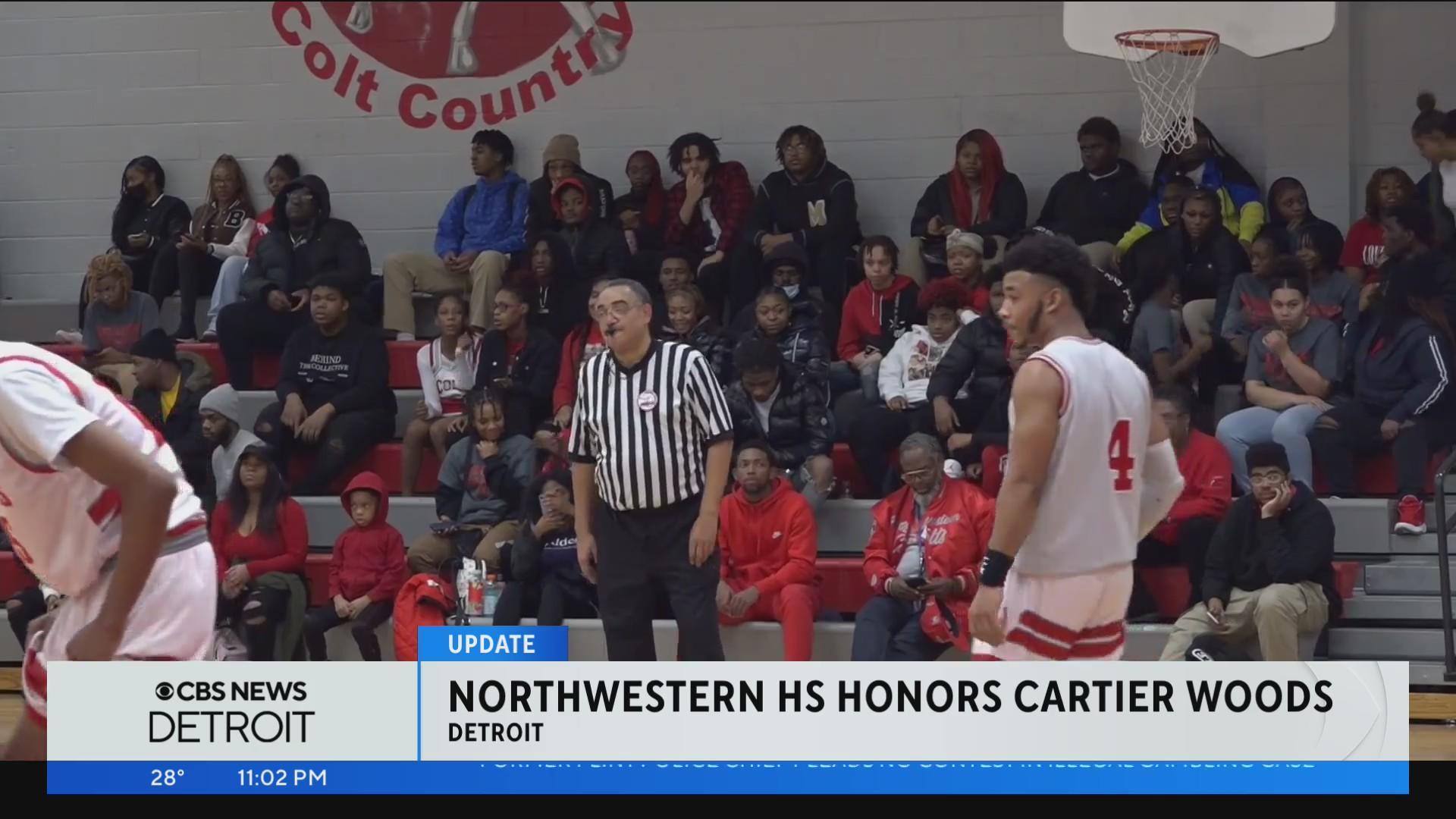 Students faculty honor Northwestern HS student Cartier Woods during playoff game