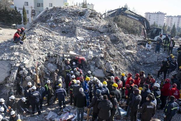 First responders rescue 7-year-old Haci Ahmet under rubble of 8-storey-building after 7.7 and 7.6 magnitude earthquakes hit multiple provinces of Turkey on Feb. 12, 2023. 