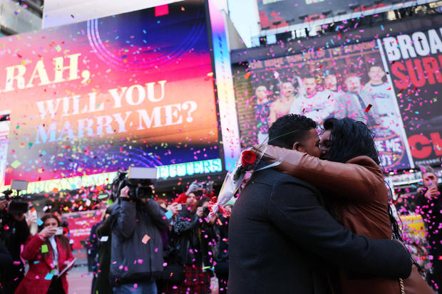 arah Persaud and David Machado kiss after getting engaged as they celebrate Valentine's Day in Times Square on February 14, 2023 in New York City. 