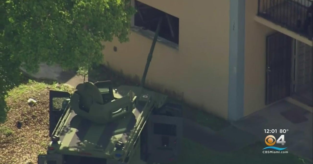 NW Dade barricaded man shot, killed by police - CBS Miami