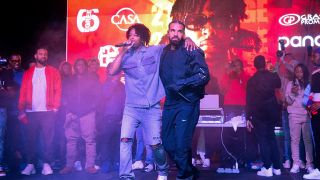 21 Savage and Drake Onstage During Wicked 