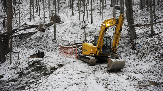 This 2018 photo released by Federal Bureau of Investigation shows the FBI's dig for Civil War-era gold at a remote site in Dents Run, Pa., after sophisticated testing suggested tons of gold might be buried there. 