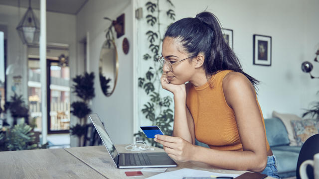 woman doing finances at home 