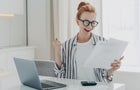 Mid Adult Woman Using Smart Phone 