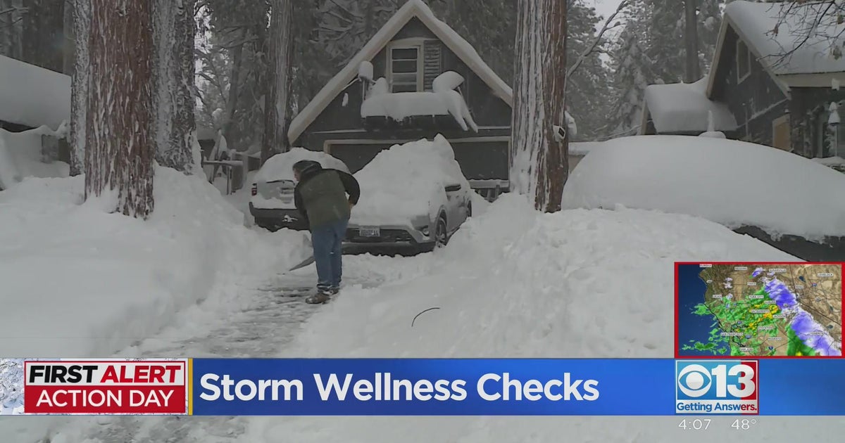 Neighbors help each other as snow accumulates across foothills
