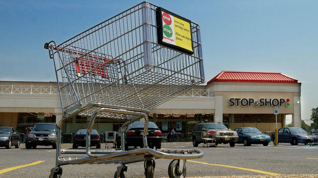 A shopping cart sits on a curb in the parking lot of a Stop & Shop supermarket in Union, New Jersey, Monday, May 10, 2004. 