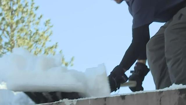 shoveling snow from roof 
