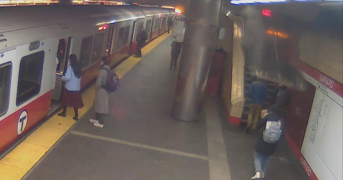 Video shows woman nearly hit by ceiling panel at MBTA station - CBS Boston