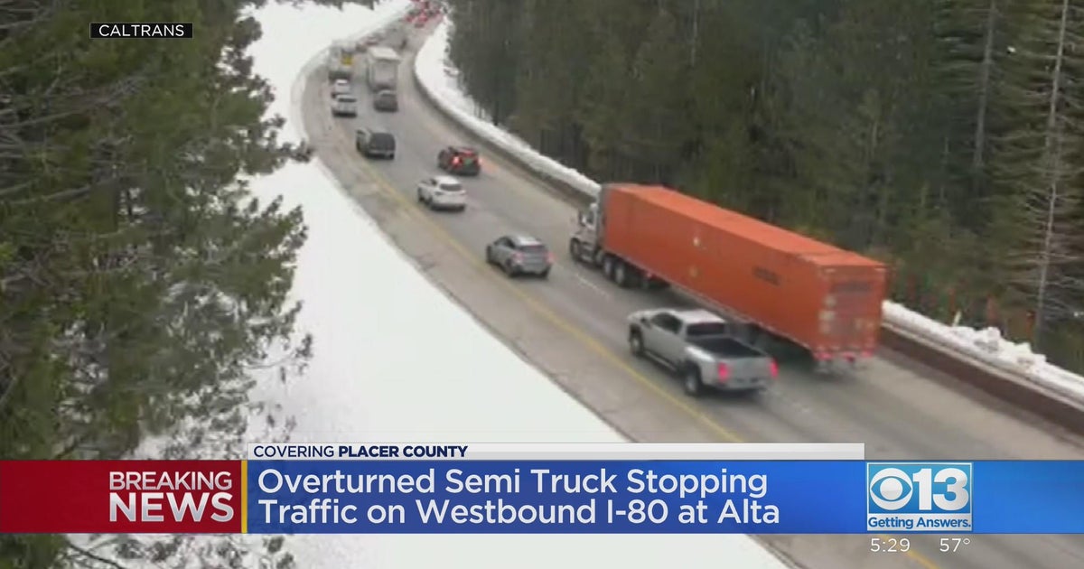 Overturned semi-truck stops traffic on westbound I-80 in Placer County
