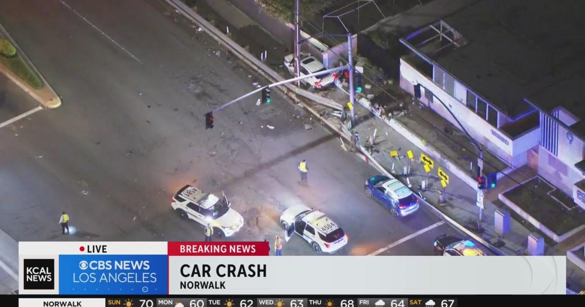 2 sent to hospital after car crashes into building in Norwalk - CBS Los ...