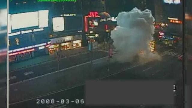 Surveillance video dated 2008-03-06 shows a large cloud of smoke next to the military recruiting station in Times Square. 