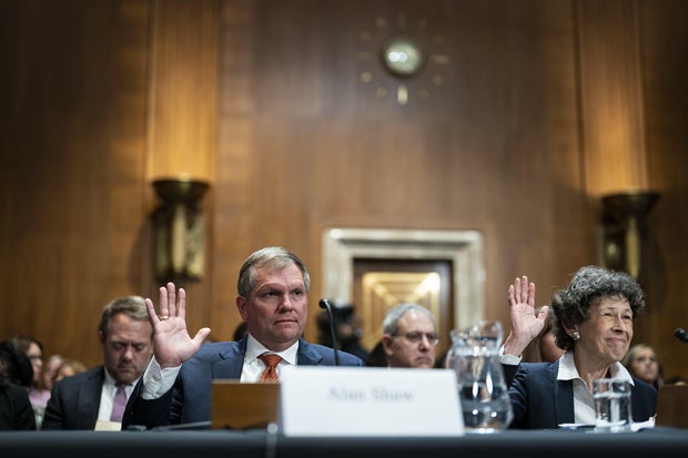 Alan Shaw, CEO of Norfolk Southern, is seen with Debra Shore, the regional administrator of the EPA