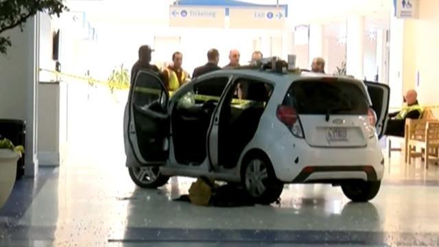 cbsn-fusion-driver-crashes-car-into-north-carolina-airport-terminal-thumbnail-1786646-640x360.jpg 