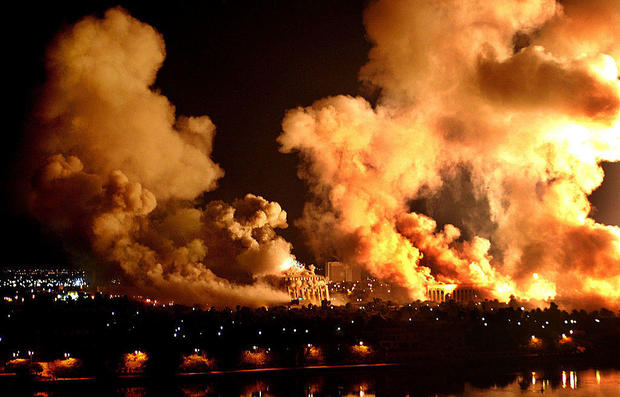 Fires rage on the west bank of the Tigris river on March 21, 2003, in Baghdad, Iraq. 