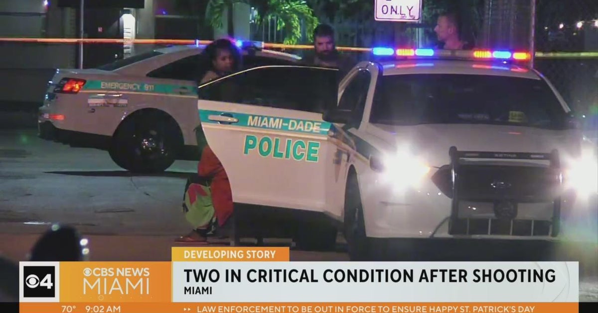 NW Miami-Dade taking pictures, two folks hurt