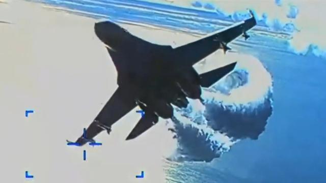 cbsn-fusion-pentagon-releases-video-of-russian-jet-collision-with-us-drone-thumbnail-1803315-640x360.jpg 