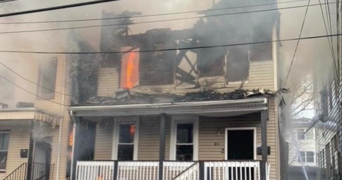 More than a dozen displaced after house fire in Newark