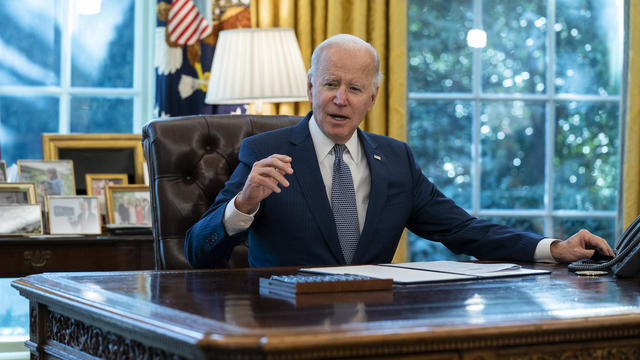 President Biden speaks before signing an executive order to improve government services in the Oval Office of the White House, Monday, Dec. 13, 2021. 