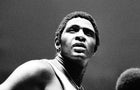 Willis Reed, center of the New York Knicks, takes a brief pause to look at the scoreboard during an NBA basketball game against the Buffalo Braves in Madison Square Garden on October 16, 1973, in New York. 