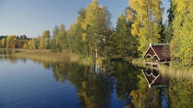 Boathouse, wooded banks of a lake, Lakeland 