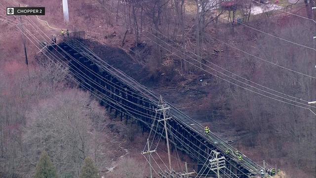 An aerial shot of a stretch of fire-damaged NJ TRANSIT tracks. 
