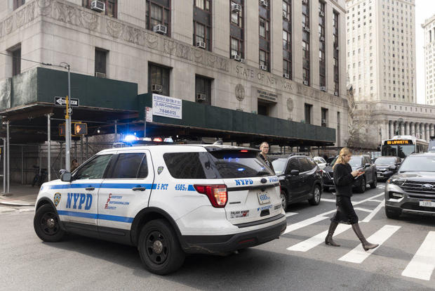 An NYPD vehicle outside a state office building in Manhattan on Wednesday, March 22, 2023. 