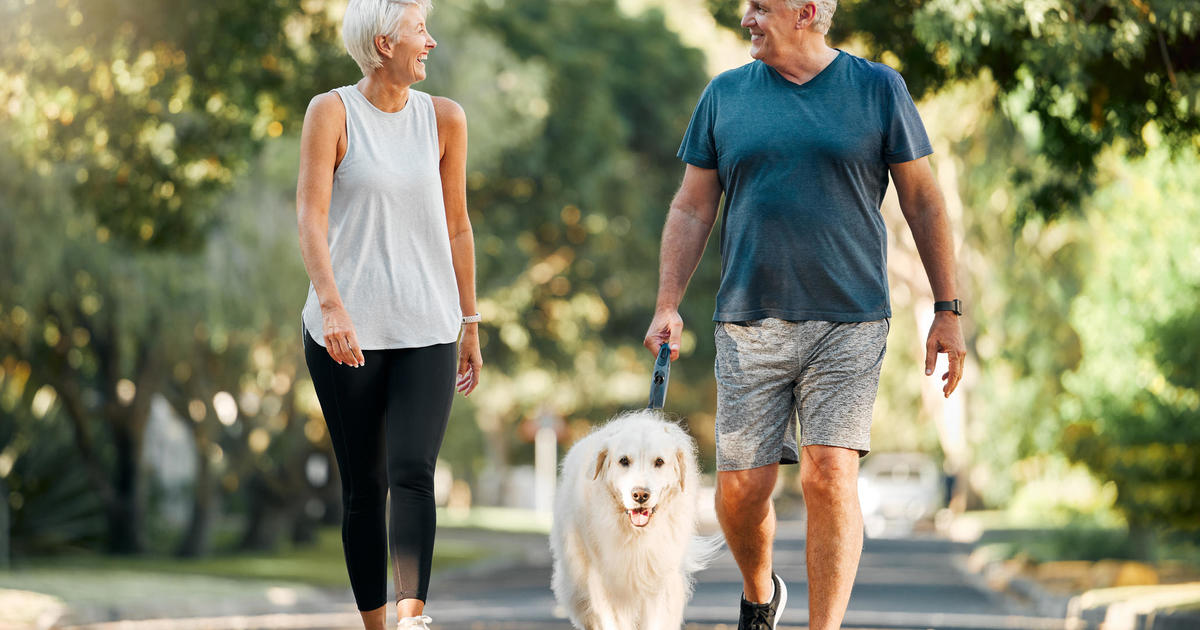 Walking and talking at the same time gets harder once you're 55, study finds - CBS News