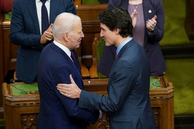 President Biden shakes hands with Canadian Prime Minister Justin Trudeau at the Canadian Parliament in Ottawa on March 24, 2023.