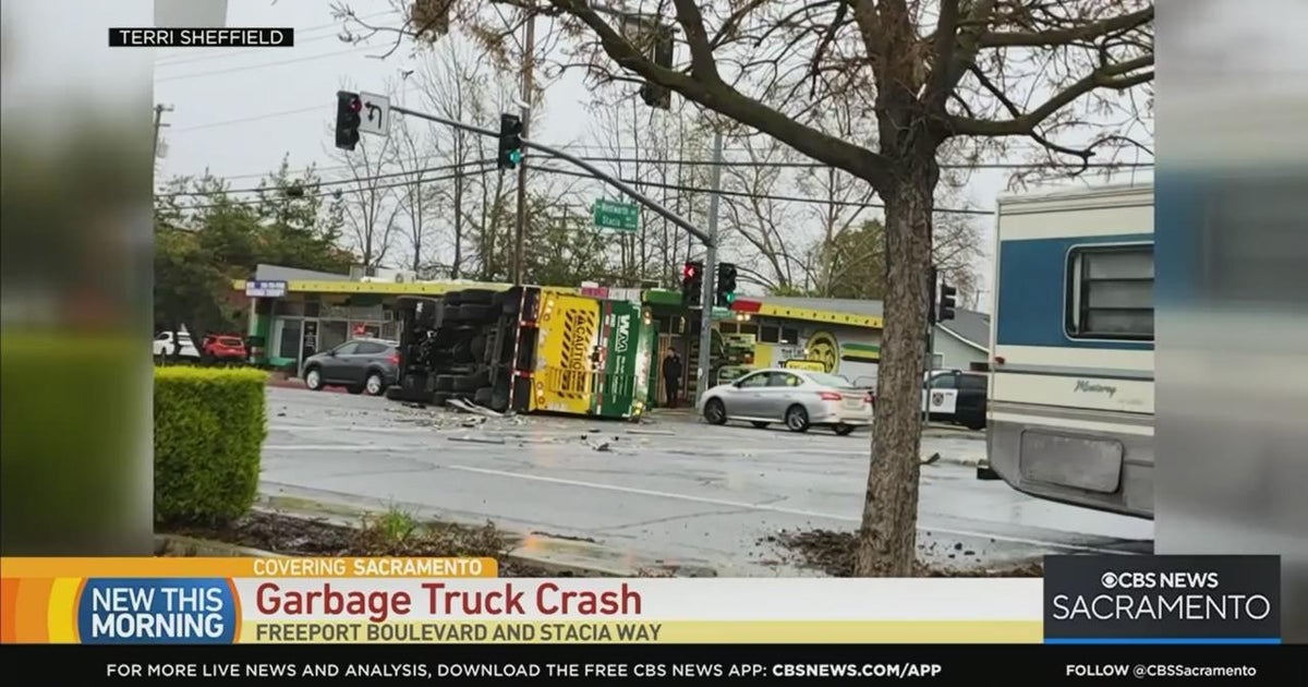 Garbage truck flips after crash on Freeport Boulevard in Sacramento