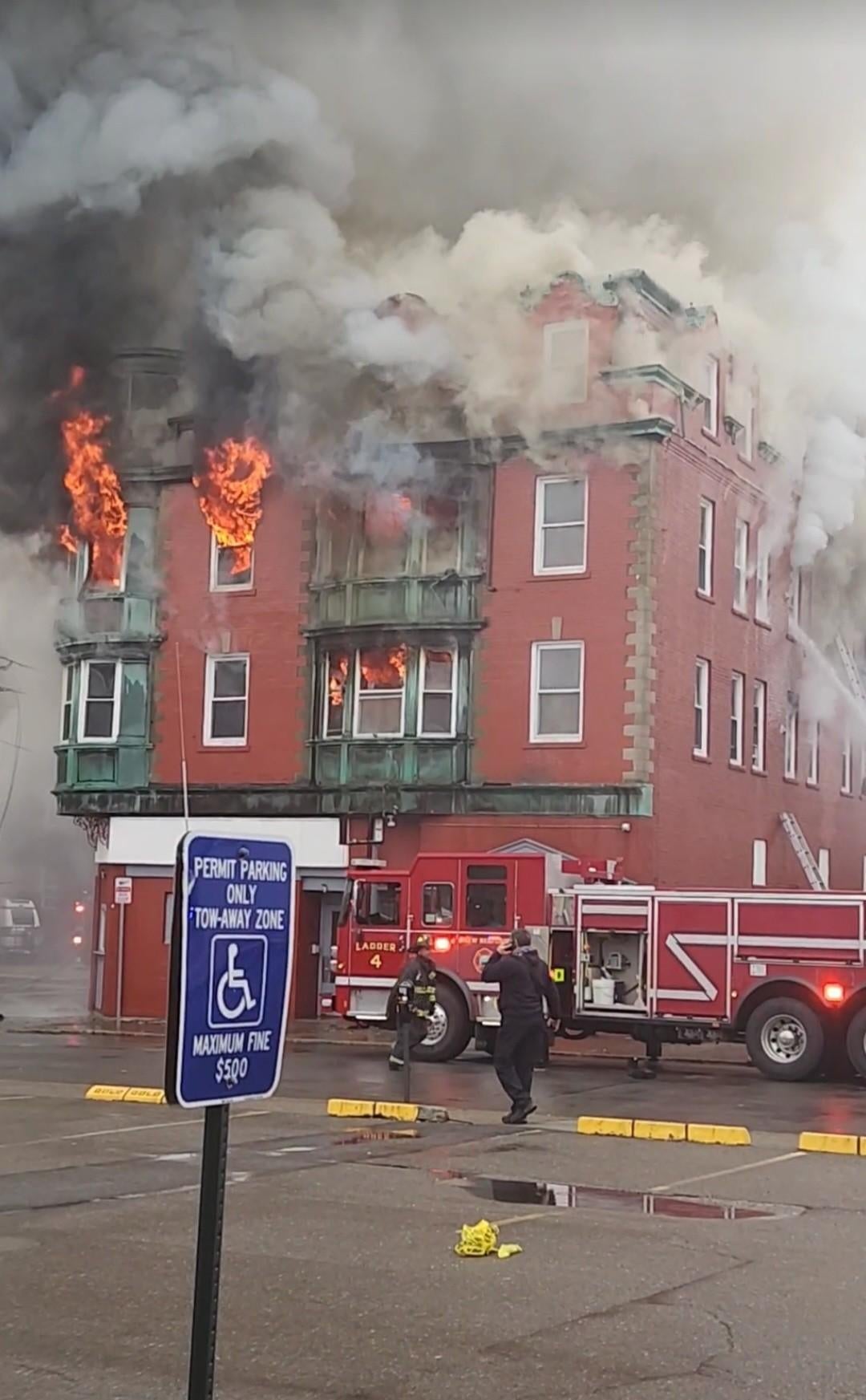 Man dead, 1 missing after massive fire at New Bedford boarding house ...