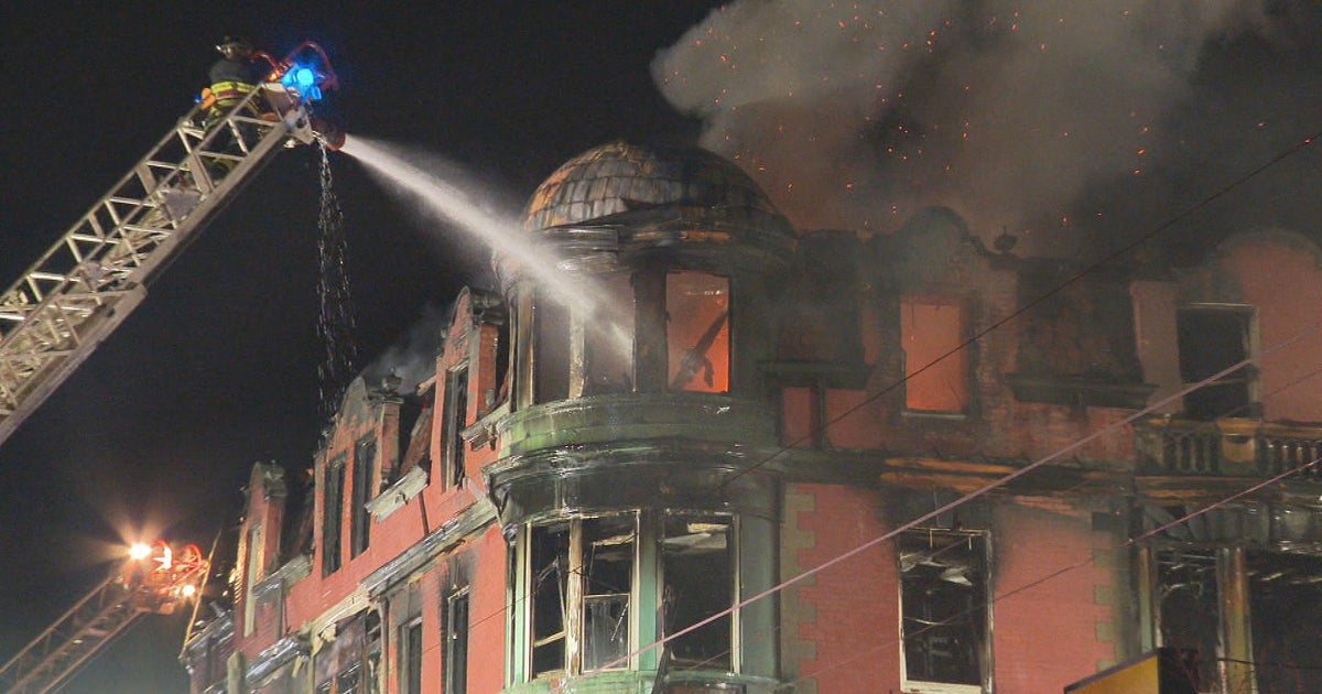 Man dead, 1 missing after massive fire at New Bedford boarding house ...