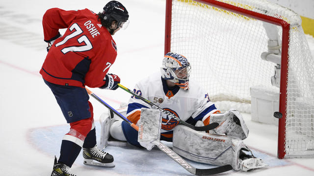 Washington Capitals right wing T.J. Oshie (77) misses during a shootout of an NHL hockey game against New York Islanders goaltender Ilya Sorokin, Wednesday, March 29, 2023, in Washington. 