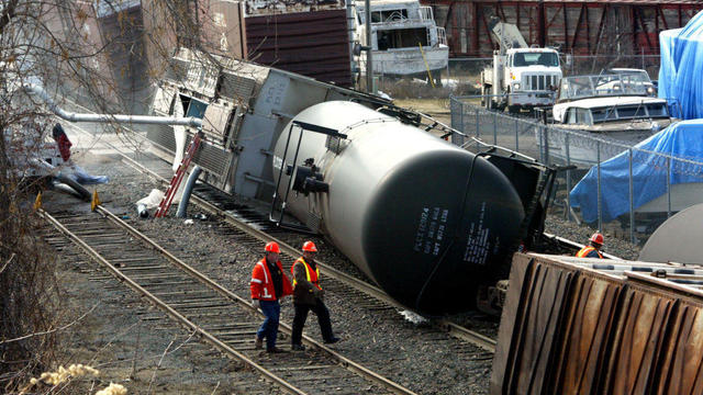 Red Wing - 04-05-03 - A Canadian Pacific Railway freight train carrying paper and plastic products derailed in downtown Red Wing around 6:20am Saturday .  Eighteen cars were derailed from the track, with no injuries reported. Railroad accident.IN THIS P 