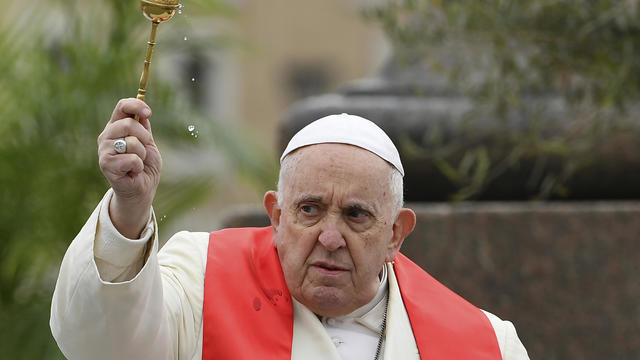 Pope Francis blesses faithful with olive and palm branches before celebrating Palm Sunday Mass in St. Peter's Square at The Vatican, April 2, 2023, a day after being discharged from the Agostino Gemelli University Hospital in Rome, where he was treated fo 