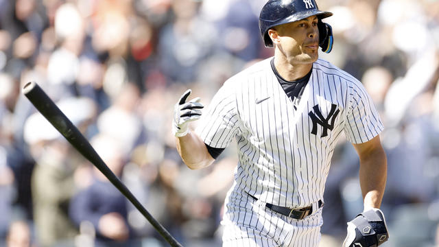 Giancarlo Stanton #27 of the New York Yankees flips his bat after hitting a two-run home run during the third inning against the San Francisco Giants at Yankee Stadium on April 02, 2023 in the Bronx borough of New York City. 